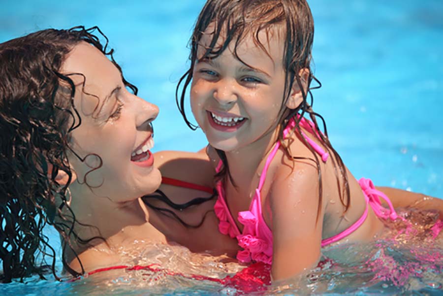 Mom and Baby swimming at Esplanade swimming pool
